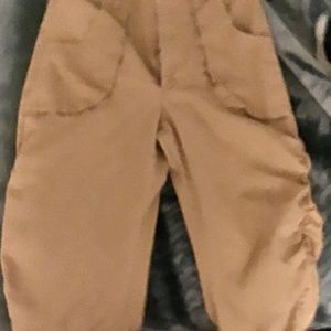 They are a pair of tan pants.